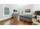 Well-lit bedroom featuring neutral tones, a comfortable bed, and stylish furnishings at 893 E Rock Springs Ne Rd, Atlanta, GA 30306