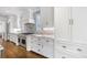 Bright kitchen showcasing white cabinetry, marble countertops, and high-end appliances at 893 E Rock Springs Ne Rd, Atlanta, GA 30306