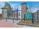Stone entrance and sign to Piedmont Park, a green space in Atlanta at 893 E Rock Springs Ne Rd, Atlanta, GA 30306