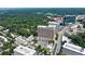 Aerial view showcasing the city skyline, modern buildings, and a lively, green neighborhood at 101 Ardmore Nw Pl # 3, Atlanta, GA 30309