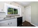 A kitchen featuring white cabinetry and stainless steel appliances and granite countertops at 101 Ardmore Nw Pl # 3, Atlanta, GA 30309