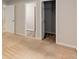 Neutral bedroom shows doorway to closet and adjacent room, and tan carpet at 1492 Saint George, Conyers, GA 30012