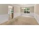 Spacious dining room featuring wainscoting and a chandelier at 1492 Saint George, Conyers, GA 30012