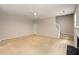 Large living room with neutral carpeting and fireplace, bathed in natural light at 1492 Saint George, Conyers, GA 30012
