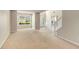 Bright living room with large windows, neutral walls, and carpeted floor at 1492 Saint George, Conyers, GA 30012