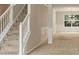 Carpeted staircase leading to the second floor at 1492 Saint George, Conyers, GA 30012