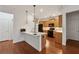 Well-appointed kitchen featuring granite countertops, modern appliances, and hardwood floors at 1680 Bluestone Dr, Cumming, GA 30041