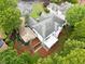 Expansive home showing driveway, and landscaping at 2321 Edgemere Lake Cir, Marietta, GA 30062