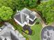 Aerial view of a stunning home with pristine landscaping at 2321 Edgemere Lake Cir, Marietta, GA 30062