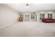 Large finished basement with comfortable seating, neutral colors, and recessed lighting at 2321 Edgemere Lake Cir, Marietta, GA 30062
