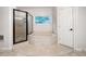 Bright bathroom featuring a jacuzzi tub and glass enclosed shower at 2321 Edgemere Lake Cir, Marietta, GA 30062