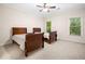 Bedroom with two beds and windows at 2321 Edgemere Lake Cir, Marietta, GA 30062