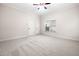 Empty bedroom with carpet and two doors, and a window with blinds at 2321 Edgemere Lake Cir, Marietta, GA 30062