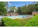 Community pool with lounge seating and building at 2321 Edgemere Lake Cir, Marietta, GA 30062