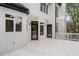 White deck adjacent to rear of home, accessible through glass doors, offers space for entertaining at 2321 Edgemere Lake Cir, Marietta, GA 30062