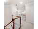 Hallway with a carpeted floor and white wooden railings at 2321 Edgemere Lake Cir, Marietta, GA 30062