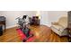 Hardwood floor and exercise equipment in the workout room at 2321 Edgemere Lake Cir, Marietta, GA 30062