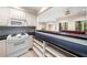 Bright kitchen showcasing a breakfast bar overlooking the living area at 2321 Edgemere Lake Cir, Marietta, GA 30062