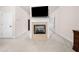 Bright living room featuring a fireplace and neutral carpeting at 2321 Edgemere Lake Cir, Marietta, GA 30062