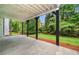 Covered patio with view of the backyard at 2321 Edgemere Lake Cir, Marietta, GA 30062