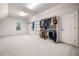 Spacious walk-in closet with custom shelving and ample storage space at 2321 Edgemere Lake Cir, Marietta, GA 30062
