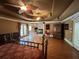 Large main bedroom with fireplace and elegant furnishings at 320 Riverbend Dr, Mcdonough, GA 30252