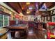 Spacious recreation room featuring a pool table, custom bar area, and unique nautical decor at 320 Riverbend Dr, Mcdonough, GA 30252