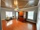 Relaxing sauna room with a wooden sauna, rocking chairs, and natural light from the windows at 320 Riverbend Dr, Mcdonough, GA 30252