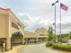 Exterior view of the College Collectibles and Haynesbrands retail stores at a shopping center at 320 Riverbend Dr, Mcdonough, GA 30252
