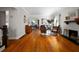 Bright living room featuring hardwood floors and an open layout with plenty of natural light at 64 Edwin Pl Nw, Atlanta, GA 30318