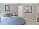 Comfortable bedroom with modern accents, bedside lighting, and stylish decor at 7220 Winderlea Ln, Cumming, GA 30040