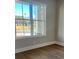Window overlooks the outdoors, letting natural light in at 7220 Winderlea Ln, Cumming, GA 30040