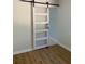 Stylish barn door features modern design at 3080 Hogan Sw Rd, Atlanta, GA 30331