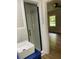 Bathroom features walk-in shower at 3080 Hogan Sw Rd, Atlanta, GA 30331