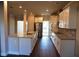 Spacious kitchen features stainless steel appliances, granite countertops, and ample cabinet space at 505 Brown Dove Ln, Grayson, GA 30017