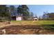 Spacious rural property featuring two barns and ample land perfect for country living at 7180 Westray Rd, Cumming, GA 30028
