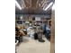 Unfinished basement with shelving and fluorescent lighting for storage at 7180 Westray Rd, Cumming, GA 30028