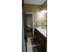 Bathroom featuring a wooden vanity with granite countertop at 7180 Westray Rd, Cumming, GA 30028