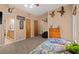 Comfortable bedroom with carpet floors, and adjacent bathroom at 7180 Westray Rd, Cumming, GA 30028