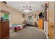 Themed bedroom with two beds, fan and multiple decor at 7180 Westray Rd, Cumming, GA 30028