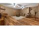 Cozy living room with wood-look flooring and rustic decor at 7180 Westray Rd, Cumming, GA 30028
