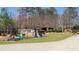 Backyard playground with a slide, swing set and climbing frame for outdoor fun at 7180 Westray Rd, Cumming, GA 30028