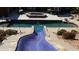 Swimming pool with slide feature at 7180 Westray Rd, Cumming, GA 30028