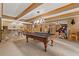 Recreation room featuring a pool table, bar area, and tile flooring at 7180 Westray Rd, Cumming, GA 30028