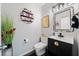 Chic bathroom features elegant decor, combining style and functionality for a modern aesthetic at 144 Wetherbrooke Ln # 4, Smyrna, GA 30082