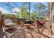 Relaxing outdoor deck with a unique egg chair, a grill and a hammock for lounging and entertaining at 144 Wetherbrooke Ln # 4, Smyrna, GA 30082