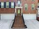 Attractive brick townhome showcasing the front entryway and garage at 144 Wetherbrooke Ln # 4, Smyrna, GA 30082