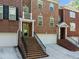 Brick townhomes with inviting entrances and attached garages at 144 Wetherbrooke Ln # 4, Smyrna, GA 30082