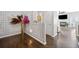 Tastefully decorated hallway leading to a living room with a fireplace at 144 Wetherbrooke Ln # 4, Smyrna, GA 30082