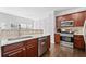 Stylish kitchen featuring granite countertops, stainless appliances, and ample storage at 144 Wetherbrooke Ln # 4, Smyrna, GA 30082